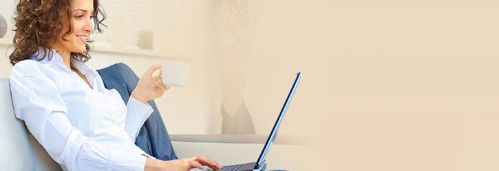 Woman sitting on chair with her laptop