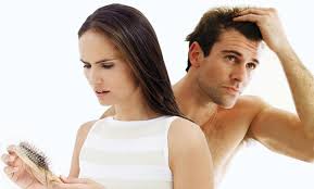 Woman and man looking at their balding hair