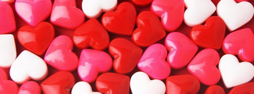 red pink and white candy hearts